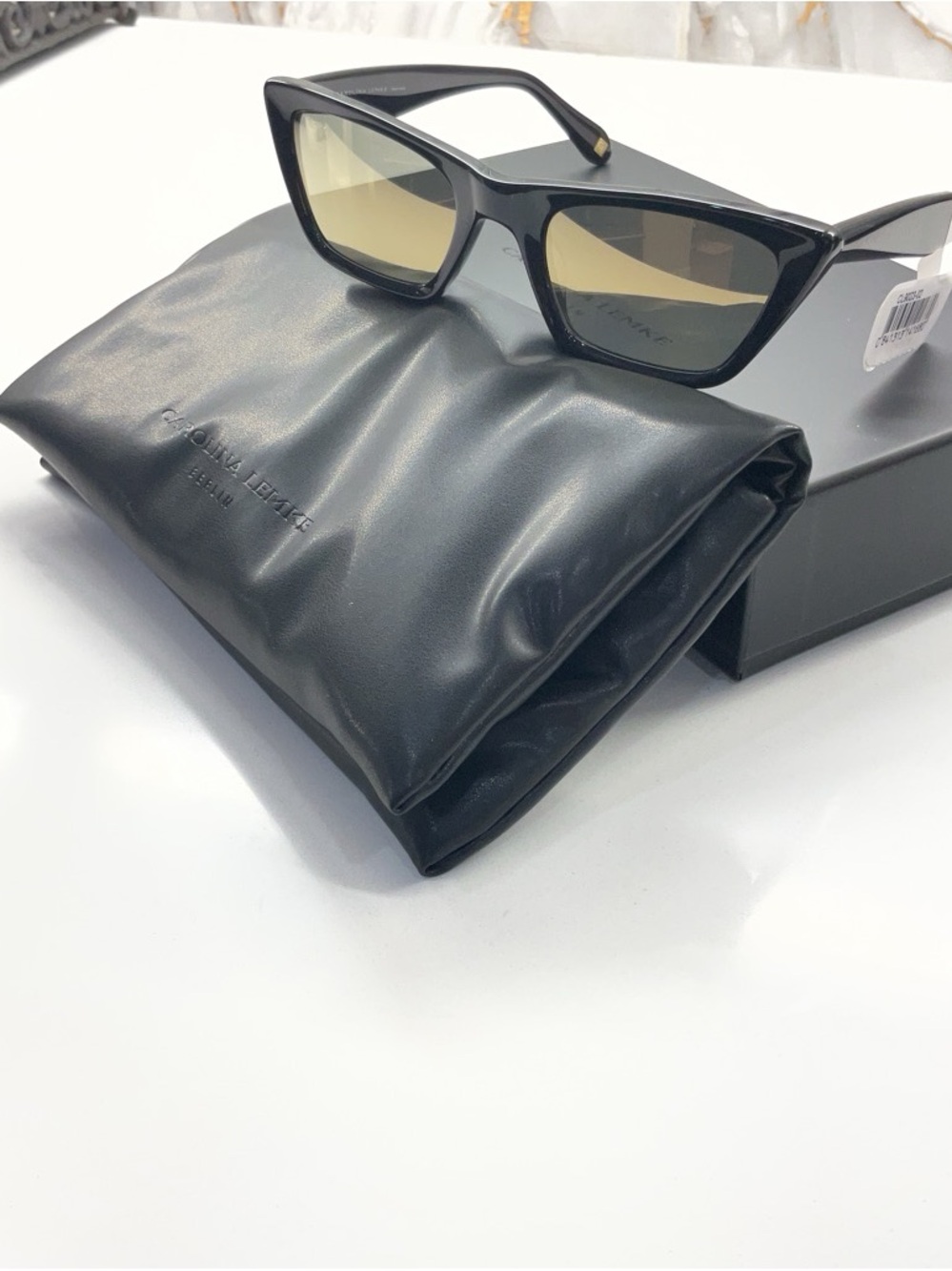 Black Cat-Eye Women’s Sunglasses with Yellow-Tinted Lenses